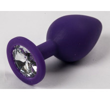 Фиолетовая силиконовая анальная пробка с прозрачным стразом - 8,2 см. (прозрачный)