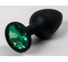 Черная силиконовая анальная пробка с зеленым стразом - 7,1 см. (зеленый с черным)