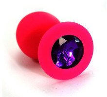 Розовая силиконовая анальная пробка с темно-фиолетовым кристаллом - 7 см. (фиолетовый)