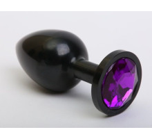 Чёрная анальная пробка с фиолетовым стразом - 7,6 см. (фиолетовый)
