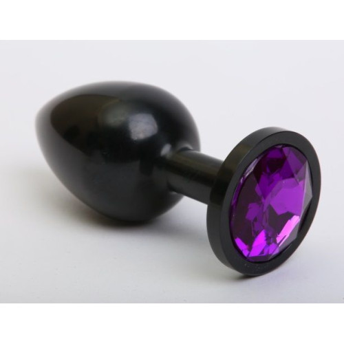 Чёрная анальная пробка с фиолетовым стразом - 7,6 см. (фиолетовый)