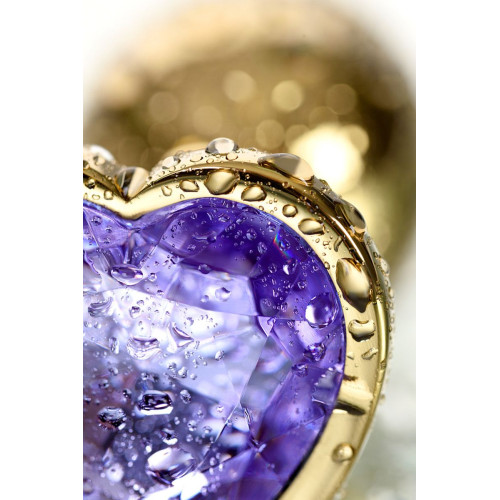 Золотистая анальная втулка с фиолетовым кристаллом-сердечком - 7 см. (фиолетовый)
