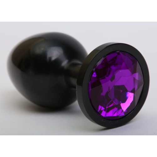 Чёрная анальная пробка с фиолетовым стразом - 8,2 см. (фиолетовый)
