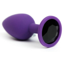 Фиолетовая анальная пробка с черным стразом - 7,6 см. (черный)