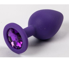 Фиолетовая силиконовая анальная пробка с фиолетовым стразом - 8,2 см. (фиолетовый)