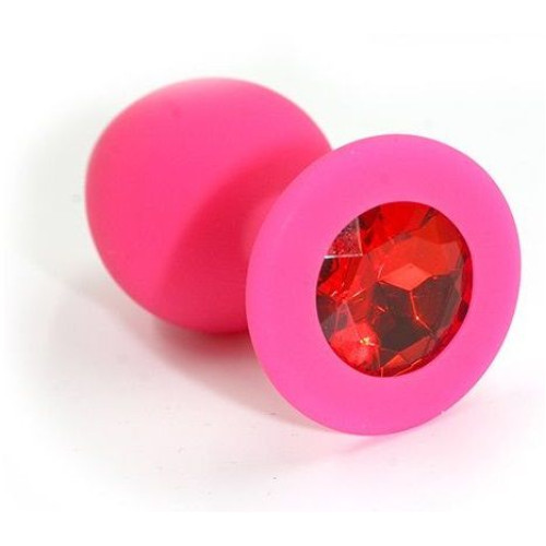 Розовая силиконовая анальная пробка с красным кристаллом - 7 см. (красный)