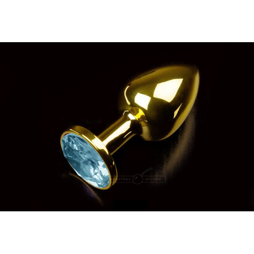 Маленькая золотистая анальная пробка с круглым кончиком и голубым кристаллом - 7 см. (голубой)