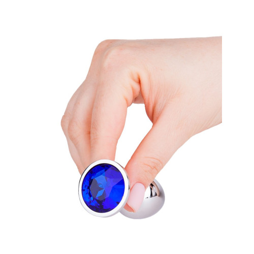 Серебристая анальная втулка с синим кристаллом - 7 см. (синий)