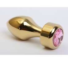 Золотистая анальная пробка с широким основанием и розовым кристаллом - 7,8 см. (розовый)