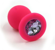 Розовая силиконовая анальная пробка с светло-фиолетовым кристаллом - 7 см. (фиолетовый)